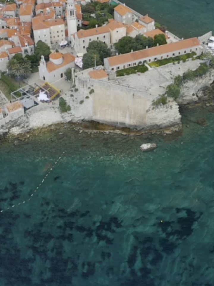 Old stone, red roofs and the Adriatic in one slow reveal