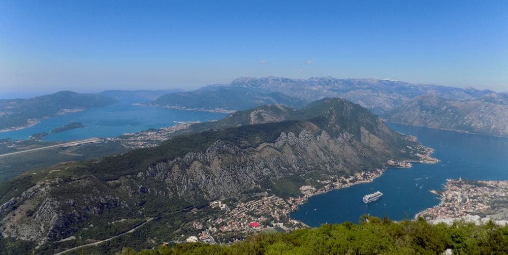 A cruise ship in the bay: on a two-ship day the old town fills from ten to three