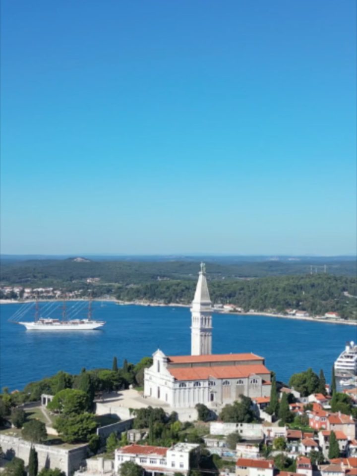 Rovinj's rooftops meet the Adriatic in one calm view